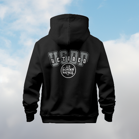 Black hoodie with text and logo on the back against a cloudy sky background